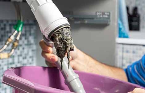 why is my dishwasher not draining